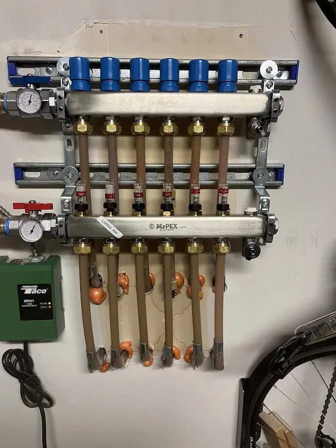 Plumber performing Gas Leak Detection at a residential property in Fitchburg